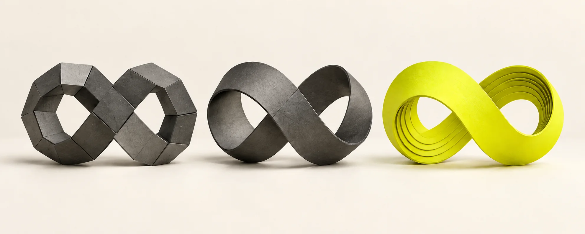 Three sculptural loops: segmented graphite, smooth graphite, and layered yellow.